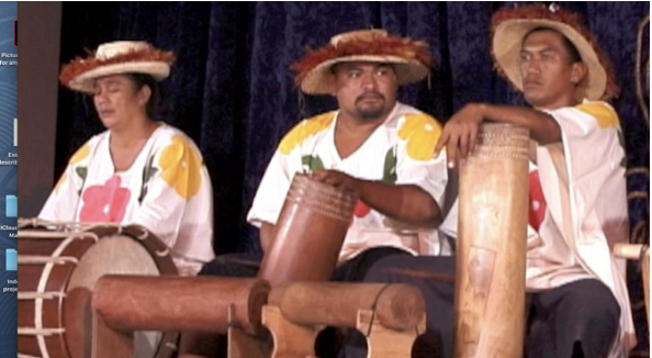 An image of three percussionist from Tahiti at a performance