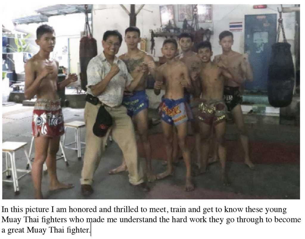 The author, Marcel, with the trainees for a photo opt