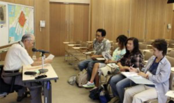 An image of Mr. Hirai Shouzou giving us a lecture on his experience of surviving the atomic bomb.