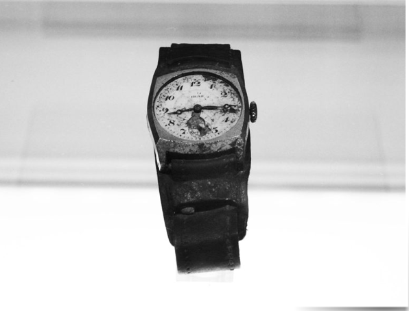 An image of a watch that survived the atomic explosion and marking the time of the explosion.