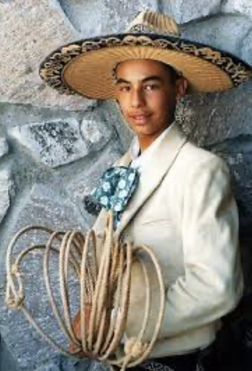 An image of a young boy dressed in charred for the Mexican National Day in September in Guadalajara